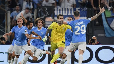UEFA Champions League: Atletico beat Lazio to secure top spot .
